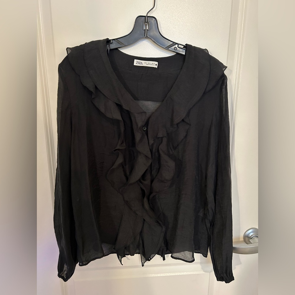Black ruffle blouse
